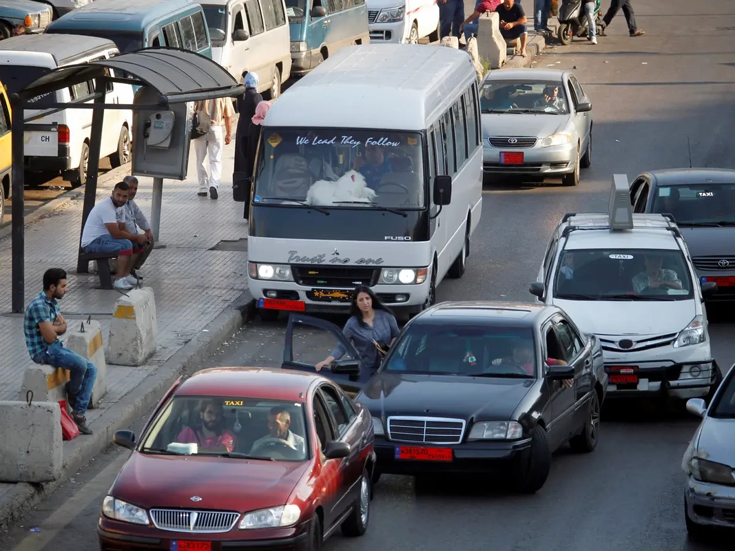PictureExploring Beirut: Public Bus #6 maneuvering through the bustling city streets to tripoli during rush hour.